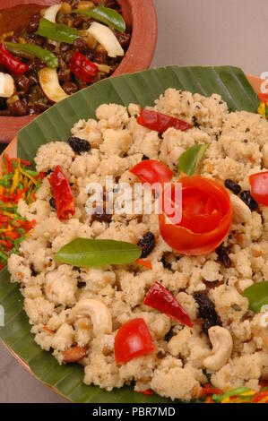 vegetable uppumavu or upma,is a breakfast dish common in south india,made of rava or sooji. Stock Photo