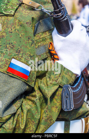 The Russian soldier with a Kalashnikov AK 74 gun in his hands. Stock Photo