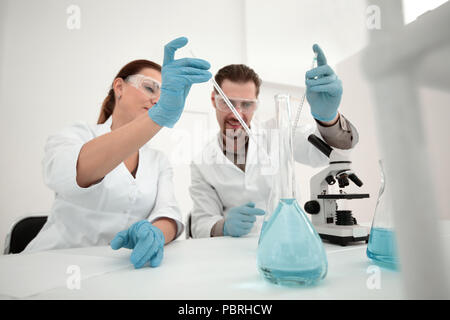 medical technicians working in laboratory Stock Photo