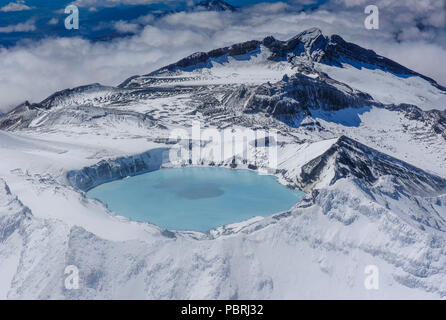 Aerial view of a tuquoise crater lake on top of Mount Ruapehu, Tongariro National Park, North Island, New Zealand Stock Photo