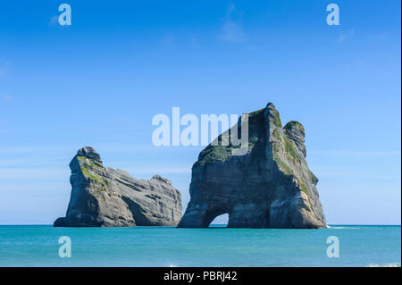 Archway islands, Wharariki Beach, South Island, New Zealand Stock Photo