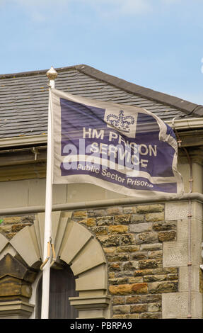 HM Prison service flag flying outside the entrance to HM Prison Swansea Stock Photo