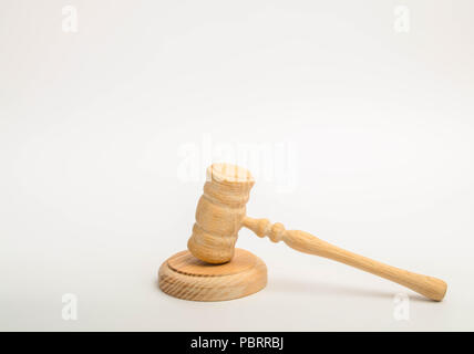 Wooden judge hammer on a white background. The concept of the court and court cases. Lawyers and prosecutors. Assistance and protection of interests i Stock Photo