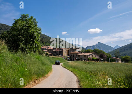 Country road leading to the village of Oix in the Catalonian Pyreenees, Spain Stock Photo