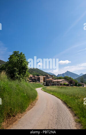 Country road leading to the village of Oix in the Catalonian Pyreenees, Spain Stock Photo