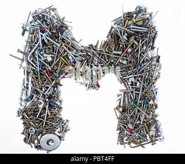 A lot of cogs, screws, bolts and moods on a white background. Latin alphabet letter. Stock Photo