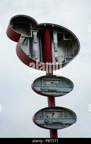 Upwards shot of broken sign Stock Photo