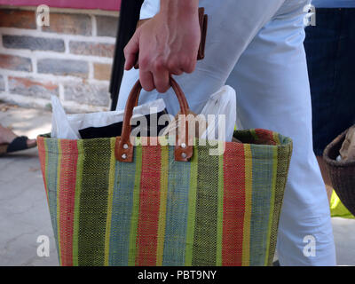 Bag for life people are now really starting to use Bags for Life, carrying this bag using two fingers only Stock Photo