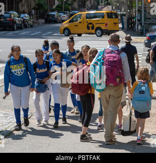 Man escorting young female students from school to home in New york USA Stock Photo