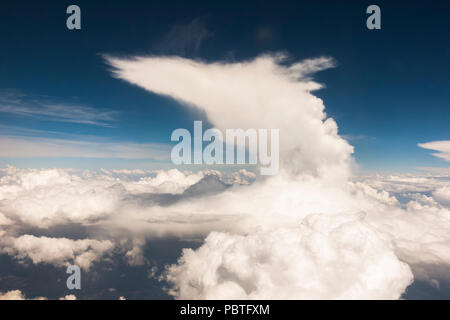 Cloud types, Cumulus clouds and nimbostratus, altostratus clouds, above France. Stock Photo