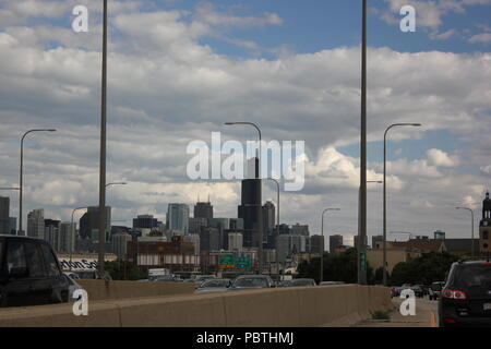 Skyline of Chicago, Illinois from the Kennedy expressway, aka the Interstate 90, on a bright sunny summer day. Stock Photo