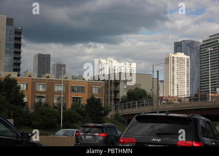 Gloomy clouds creeping over Chicago, Illinois on the I-90 expressway and side streets. Stock Photo