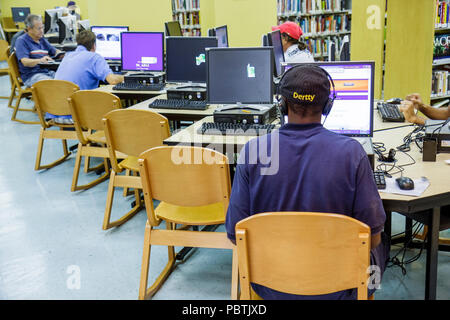 Miami Beach Florida,South Shore Public Library,desks,computers,chairs,monitors,Internet,access,free visitors travel traveling tour tourist tourism lan Stock Photo