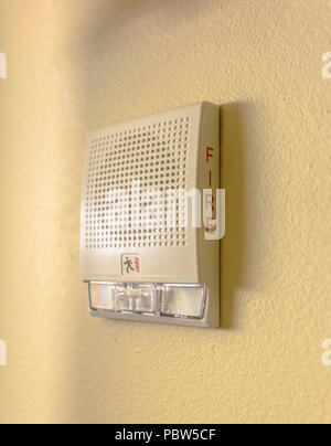 White fire alarm speaker in hotel Stock Photo