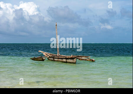 Old wooden dhow, fishing boats in the ocean. Kenya, Africa Stock Photo
