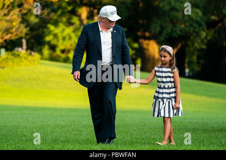 Washington, DC, USA. 29th July, 2018. U.S. President Donald J. Trump (L) and his granddaughter Arabella Rose Kushner (R) walk across the South Lawn as they return from a weekend stay in Bedminster, New Jersey at the White House in Washington, DC, USA, 29 July 2018. Earlier in the day, the President once again went after the media on Twitter, calling them the 'enemy of the people.' Credit: Jim LoScalzo/Pool via CNP | usage worldwide Credit: dpa/Alamy Live News Stock Photo