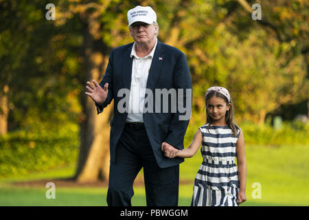 Washington, District of Columbia, USA. 29th July, 2018. U.S. President DONALD J. TRUMP (L) and his granddaughter ARABELLA ROSE KUSHNER (R) walk across the South Lawn as they return from a weekend stay in Bedminster, New Jersey at the White House in Washington, DC, USA. Earlier in the day, the President once again went after the media on Twitter, calling them the 'enemy of the people.' Credit: Jim Loscalzo/CNP/ZUMA Wire/Alamy Live News Stock Photo