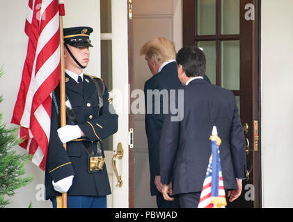 Washington, United States Of America. 30th July, 2018. United States President Donald J. Trump welcomes Prime Minister Giuseppe Conte of Italy to the White House for talks in Washington, DC on Monday, July 30, 2018. Credit: Ron Sachs/CNP | usage worldwide Credit: dpa/Alamy Live News Stock Photo