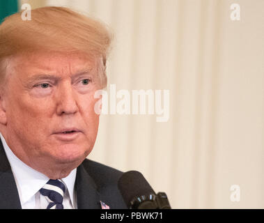 United States President Donald J. Trump holds a joint press conference with Prime Minister Giuseppe Conte of Italy in the East Room of the White House in Washington, DC on Monday, July 30, 2018. Credit: Ron Sachs/CNP /MediaPunch Stock Photo