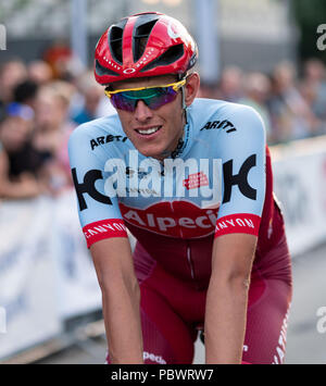 Hanover, Germany. 30th July, 2018. 30.07.2018, Lower Saxony, Hanover: Cycling: Professional cyclist Nils Pollit, Team Katusha-Alpecin, rides the approximately 850-metre circuit in front of the New Town Hall in Hanover during the 'Die Nacht' race. Credit: Peter Steffen/dpa/Alamy Live News Stock Photo