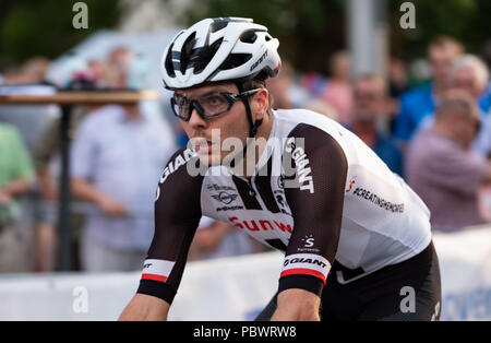 Hanover, Germany. 30th July, 2018. 30.07.2018, Lower Saxony, Hanover: Cycling: The professional cyclist Maximilian Walscheid, Team Sunweb, rides the approximately 850-meter circuit in front of the New Town Hall in Hanover during the 'Die Nacht' race. Credit: Peter Steffen/dpa/Alamy Live News Stock Photo