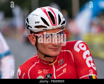 Hanover, Germany. 30th July, 2018. 30.07.2018, Lower Saxony, Hanover: Cycling: Professional cyclist Andre Greipel, Team Lotto-Soudal, smiles before the 'Die Nacht' race about 850 meters long circuit in front of the New Town Hall in Hanover. Credit: Peter Steffen/dpa/Alamy Live News Stock Photo