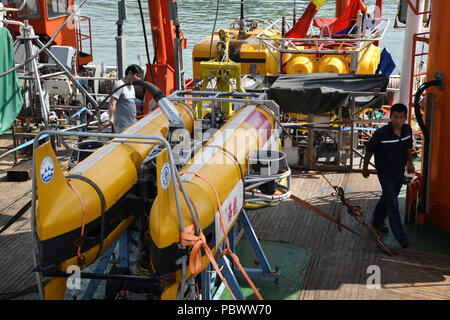 Qingdao. 31st July, 2018. Photo taken on July 31, 2018 shows research devices on the deck of research vessel Dayang Yihao (Ocean No.1) at the base station of North China Sea Branch of the State Oceanic Administration in Qingdao, east China's Shandong Province. The Chinese research vessel Dayang Yihao (Ocean No.1) kicked off the country's 48th oceanic expedition mission on Tuesday. The vessel is expected to go on a voyage of about 6,700 sea miles in its 100-day expedition. Credit: Li Ziheng/Xinhua/Alamy Live News Stock Photo