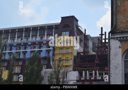 Large rain drops on the background of construction of buildings Stock Photo