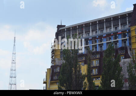 Large rain drops on the background of an unfinished building Stock Photo