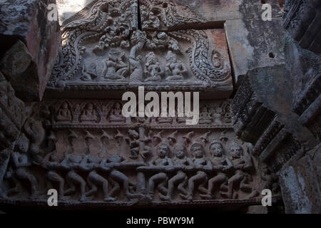 Battambang Cambodia, carved pediment depicting the hindu mythology of Churning of the Ocean of Milk at the Wat Ek Phnom a 11th century angkorian templ Stock Photo