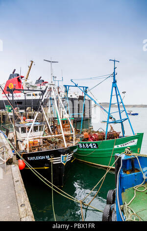 Traditional fishing boats moored at the original fishing quay in Oban, Argyll and Bute, Scotland, UK Stock Photo