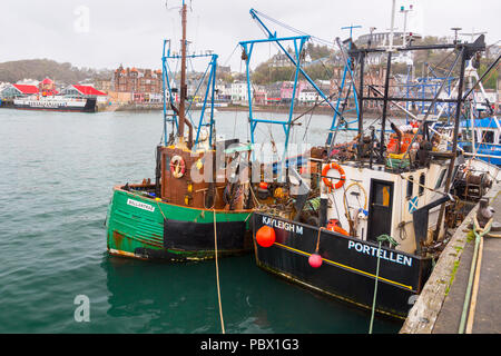 Traditional fishing boats moored at the original quay in Oban, Argyll and Bute, Scotland, UK Stock Photo