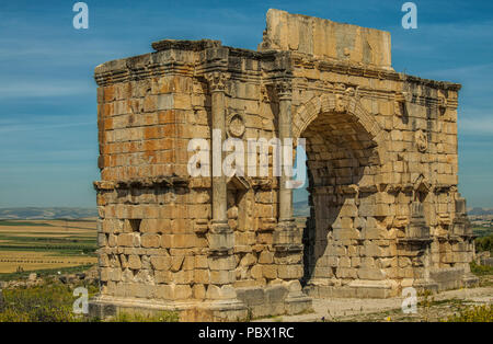 Triumphal Arch - North side of the Arch of Caracalla in Volubilis, Morocco. Built in 217 AD, The Arch of Caracalla was built in honor of the Roman Emp Stock Photo
