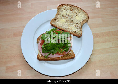 ham sandwich on whole grain brown bread Stock Photo