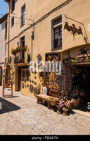 Souvenir shop El Drac Magic, on Pont Vell in Besalu cobbled streets, Garrotxa, Catalunya, Spain Stock Photo