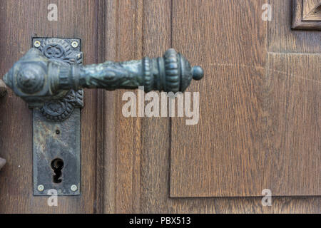 vintage door handle from old building in europe Stock Photo