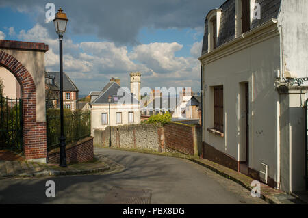 Looking down the street towards the old lighthouse in Honfleur, Normandy, France Stock Photo