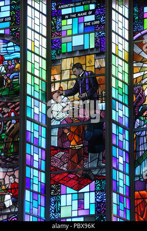 Stained glass window by Harry Clarke Studio at  All Saints Church in Drimoleague Stock Photo