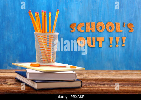 Schools end inscription and supplies on blackboard background Stock Photo