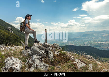 Young trekker in  the mountain top, Abruzzo Stock Photo