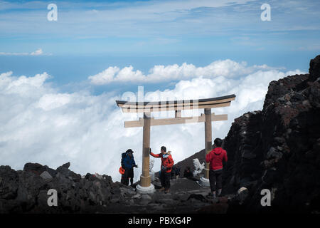 Torii gate on the summit of mount Fuji in Japan (3776 meter) Stock Photo