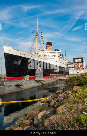 The Queen Mary ship, now a museum and major tourist attraction with Russian submarine the Scorpion docked beside it, in Long Beach, California, CA, US Stock Photo