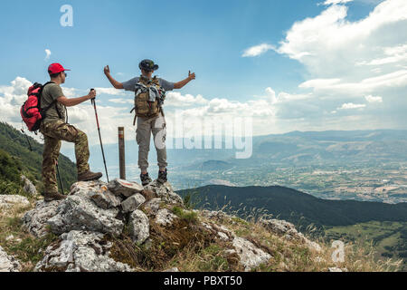 Young trekkers in  the mountain top, Abruzzo Stock Photo