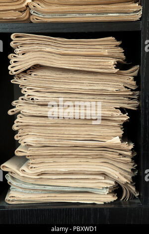 A stack of old newspapers, old, fat yellow. Stock Photo