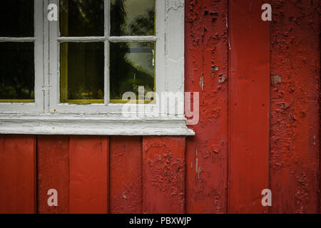 Peeling paintwork on a Norwegian church. Stock Photo