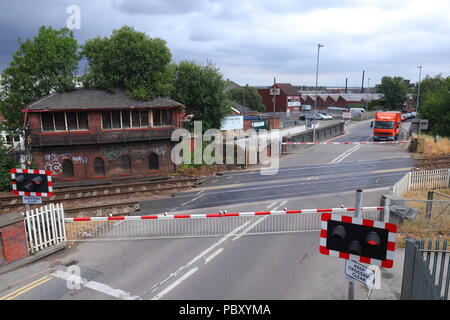 Looking down on a level crossing situated between High Street & Albion Street in Castleford, West Yorkshire Stock Photo