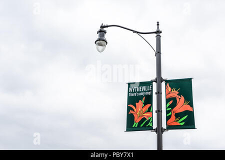 Wytheville, USA - April 19, 2018: Small town village sign on lamp post in southern south Virginia with 'there's only one' banner Stock Photo