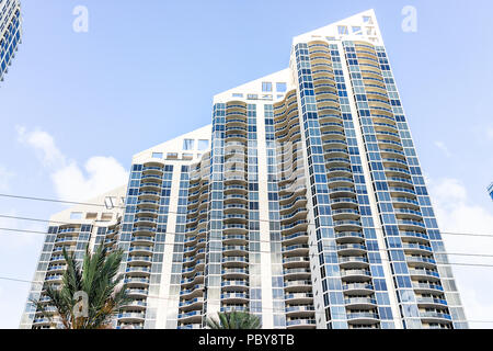 Sunny Isles Beach, USA - May 4, 2018: Apartment condo Pinnacle building balconies during sunny day in Miami, Florida with skyscraper, nobody perspecti Stock Photo