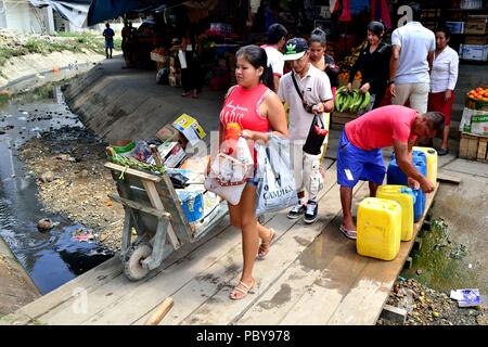 Transporting gasoline - Border Peru - Ecuador . Department of Tumbes ...