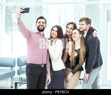 friendly business team standing near the office window Stock Photo - Alamy